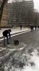 Curling With Beer Crates on Iced Over Street