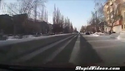 Drunk Guy Tries to Walk Across Icy Road