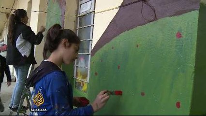 Syrian refugee children transform Iraqi prison with art