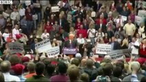 Muslim protester ejected from Donald Trump rally - BBC News (Daily Videos)