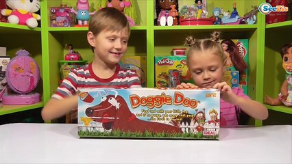 ✔ DOGGIE DOO. Ярослава и Игорек распаковывают новую игрушку - Yaroslava with Igorek unboxing new toy