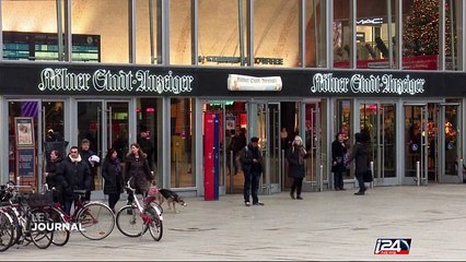 A. Merkel contrainte de restreindre sa politique sur l'immigration