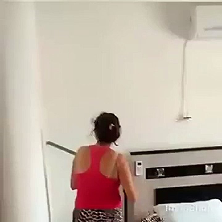 woman cleaning her room very funny !!!!  LOL