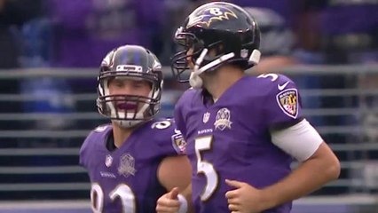 Ravens Joe Flacco runs up the middle for a 1-yard touchdown