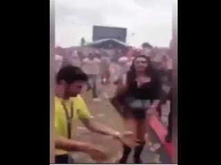 Shocking moment dancing festival goer is hit by unexpected wall of death