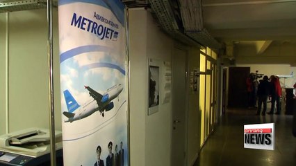 Russian plane broke up at high altitude: official