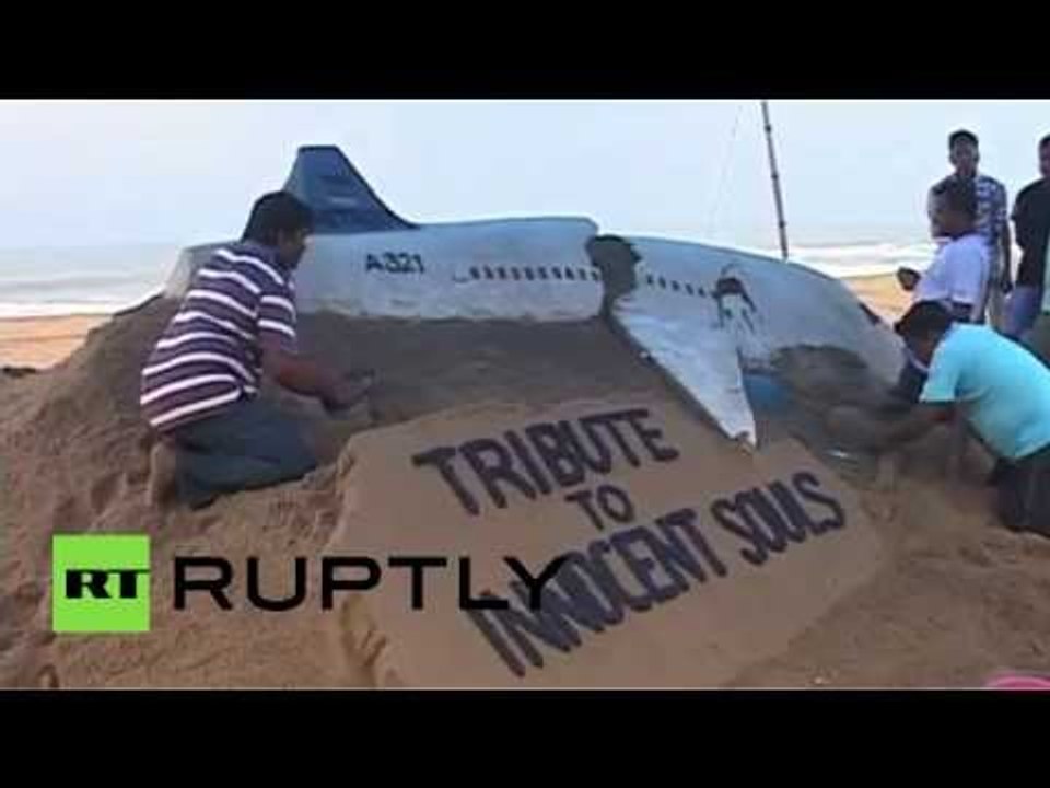 'Tribute to innocent souls': Artist creates sand sculpture of 7K9268 plane to commemorate victims