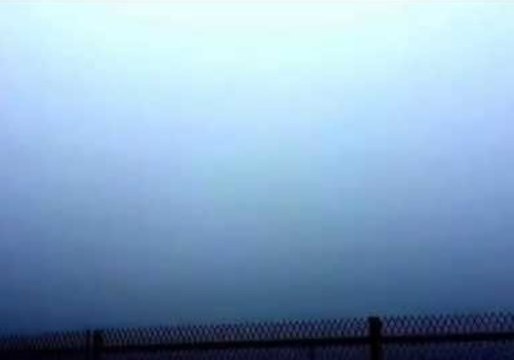 Dramatic Video Shows Jet Emerging From Fog at Heathrow Airport