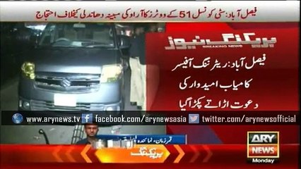 Returning Officer celebrating a candidate's win in LB polls