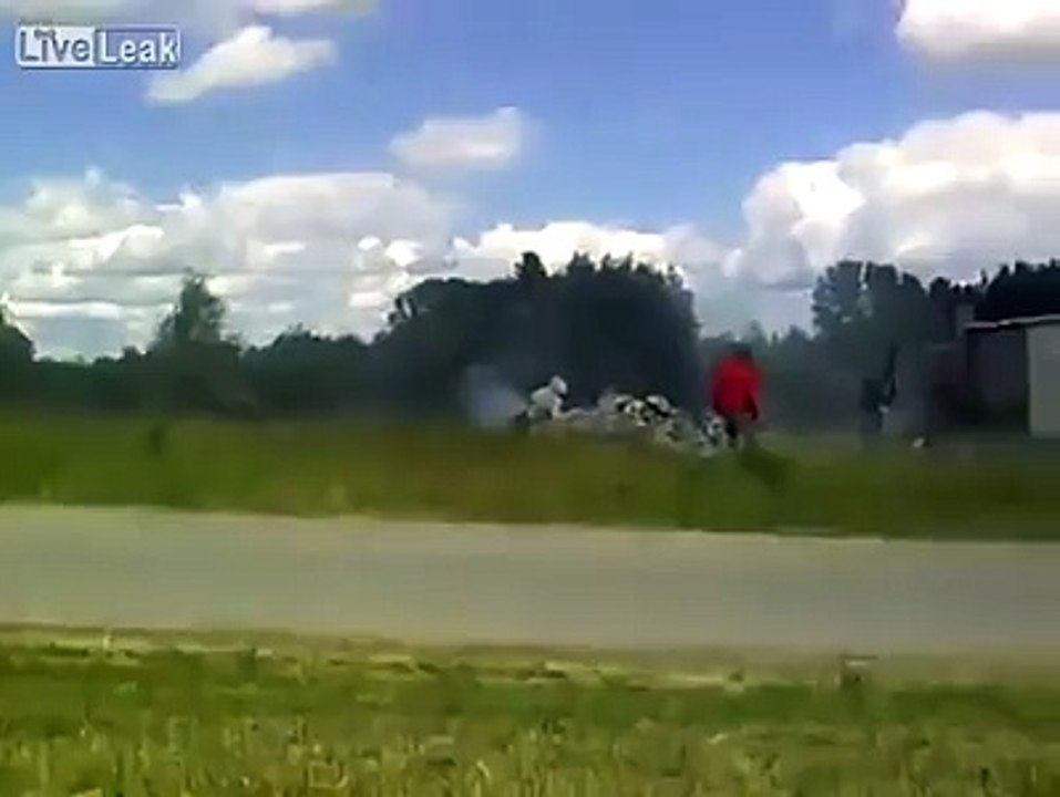 Rally spectators have an extremely close call! Not a great place to stand for one of these races...
