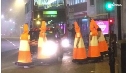 Download Video: Police called after men dressed as traffic cones block traffic on Halloween