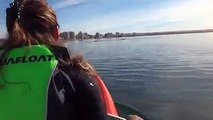 Whale lifts up kayakers off Argentine coast