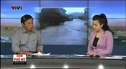 Anchorman removes his ringing phone from the shot with the least amount of subtlety.