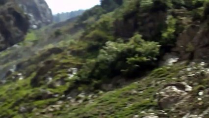 aamir bati taking picture at water fall - falling in the river of swat pakistan