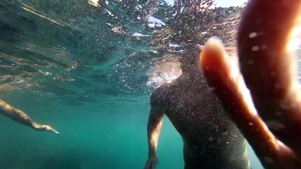 A local waterman charging the ocean in laguna Beach retro style