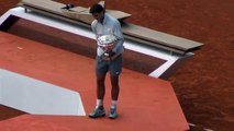 Rafael Nadal cramp lifting his trophy