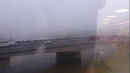 Thick fog over Tower Bridge and The Shard