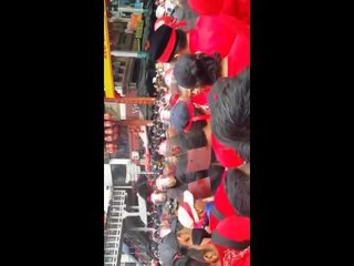 Red Shirt discussing with police