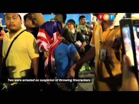 Two were arrested on suspicion of throwing firecrackers