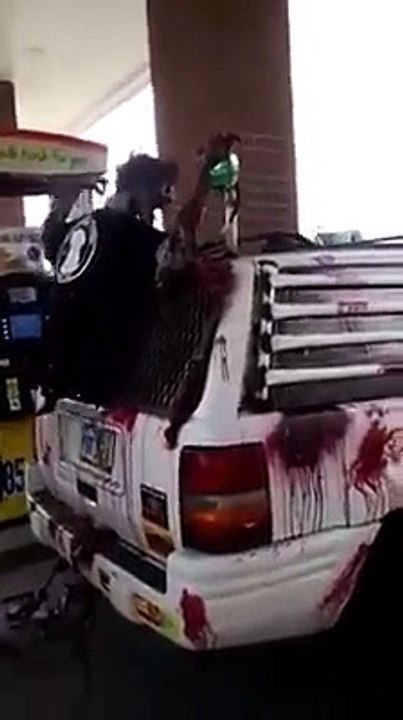 Zombie van on a petrol pump