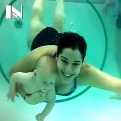 Babies having swimming lessons - an underwater view!
