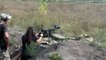 Ukrainian military woman firing DSHK Heavy Machine Gun