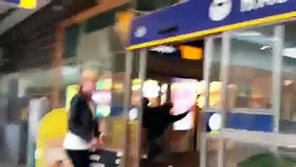 Armed robber gets trapped in the store he just held up.