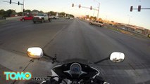 Tender-hearted biker stops traffic at busy intersection to rescue kitten