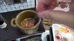 Man cooks Noodles with miniature kitchen and mini dishes