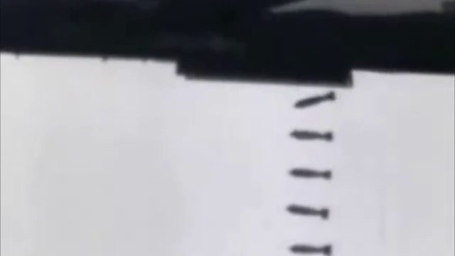 How many bombs were dropped in Laos by the US Air Force from 1965 to 1973