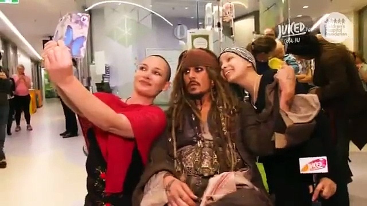 Johnny Depp surprises sick children in Australian hospital