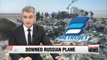 Britain says Russian plane may have been downed by bomb, bans flights