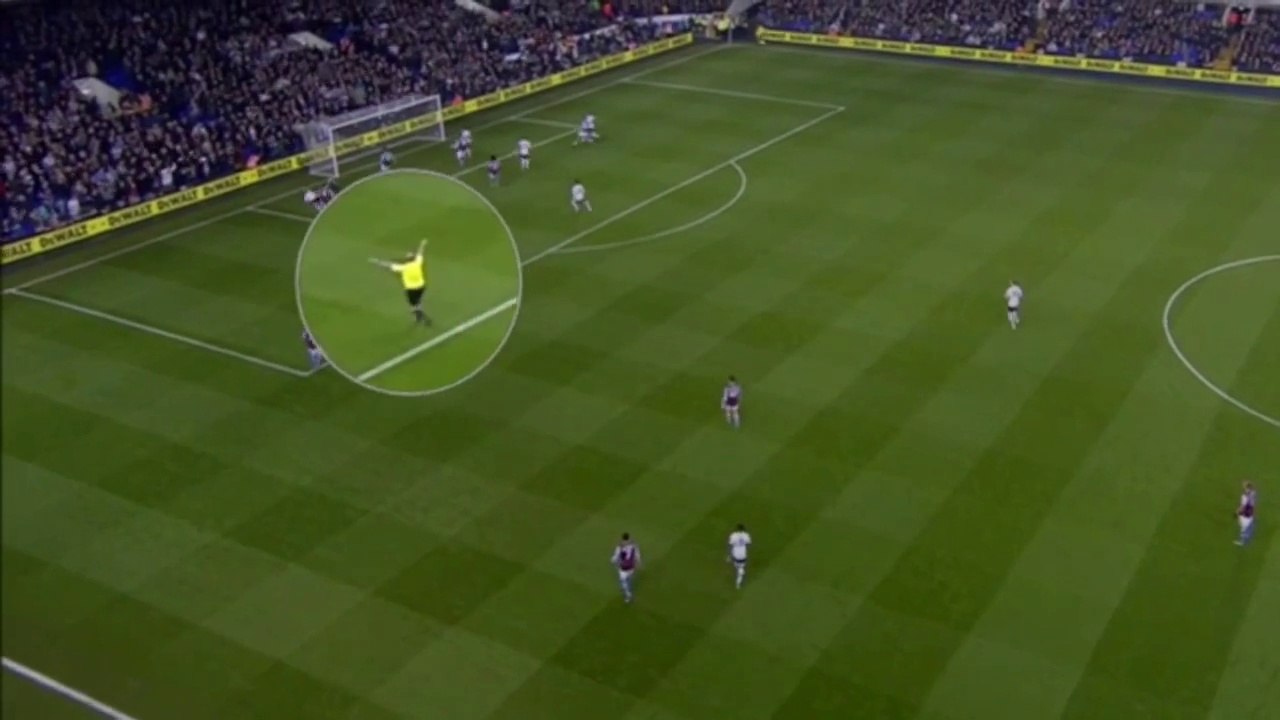 Referee Mike Dean celebrating Tottenham goal vs Aston Villa