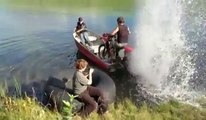 crazy Driving a motorcycle on a lake