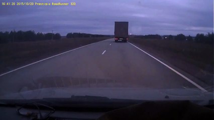 How NOT to overtake a truck on the highway.