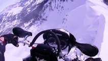 Guy Nearly Drives Off A Cliff On A Snowmobile