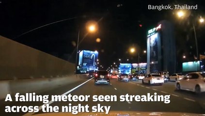 Footage of a falling meteor seen streaking across the night sky in Thailand