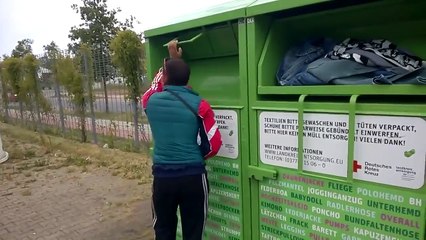 Two guys are stealing humanitarian clothing