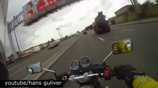 Motorcyclist almost knocked down by car in high speed