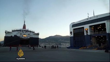 Lesbos crumbles under refugee influx