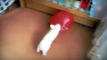 Blowing up a red balloon rabbit After a very scared