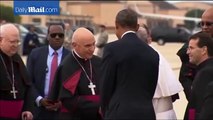 The Obama family greet Pope Francis as he arrives in US
