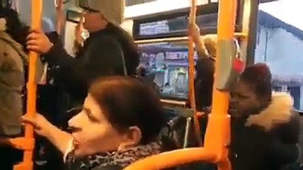 See How Desi Aunty is Fighting with Black Aunty in a Public Transport of London