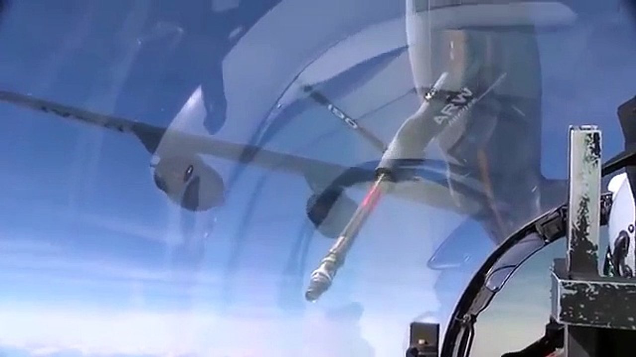 US Air Force F 35 and F 15 Military Aircraft flying in Formation