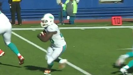 Dolphins Lamar Miller runs it in from 1-yard out for the touchdown