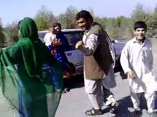 Afghani Wife Dancing On Road With Husband