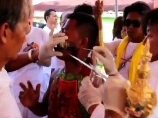 Vegetarian festival- Painful rituals forcing knives through own cheeks