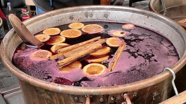London Street Food and Drinks from Italy. Mulled Wine and Spiced Mulled Apple Juice in Brick Lane
