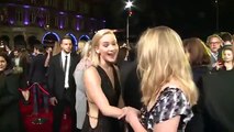 Jennifer Lawrence & Natalie Dormer Accidentally Kiss On Hunger Games Carpet!