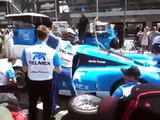 Woman Gets Knocked Over By Pit Crew
